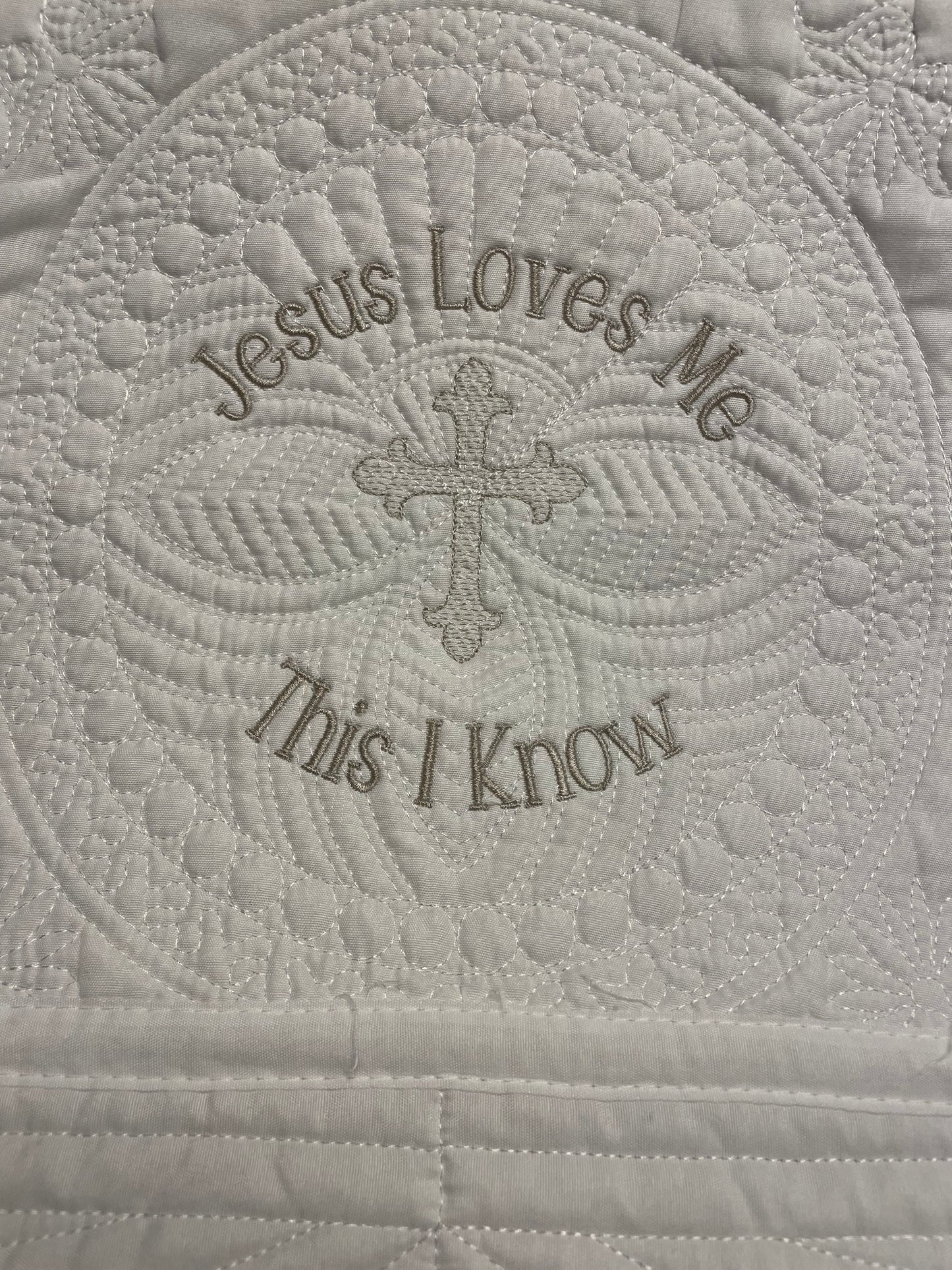 "Jesus Loves Me" White Baby Quilt